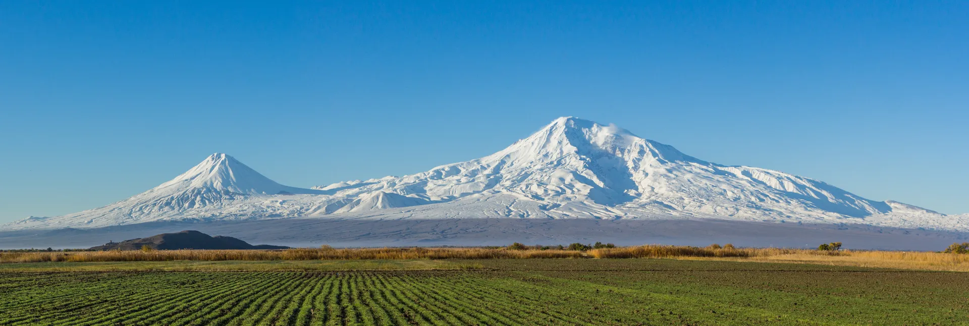 Mount Ararat with the historic Khor Virap monastery visible at center-left
